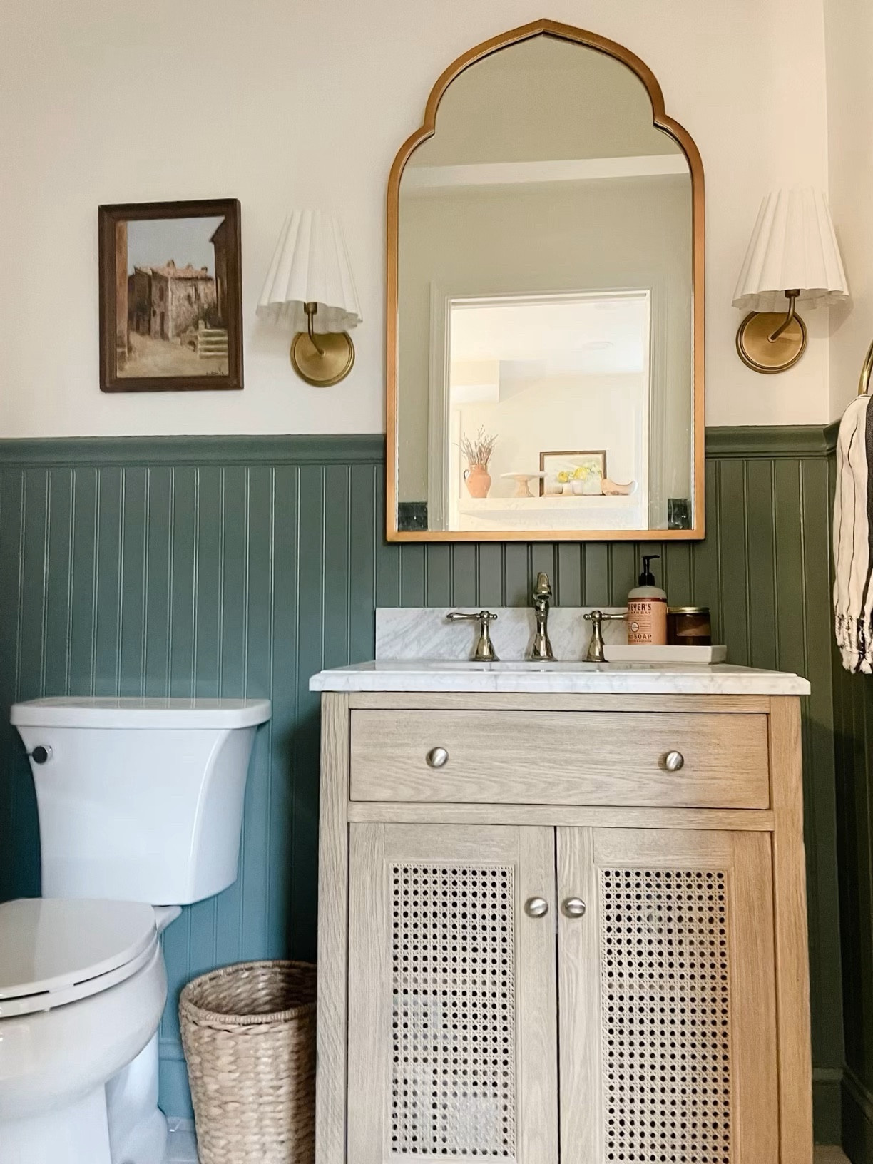 Green Powder Bathroom Reno.  Loving the bead board, handmade Moroccan floor tiles, layered with a peonyandolive.com mini vintage rug 🥰

#LTKhome #LTKMostLoved