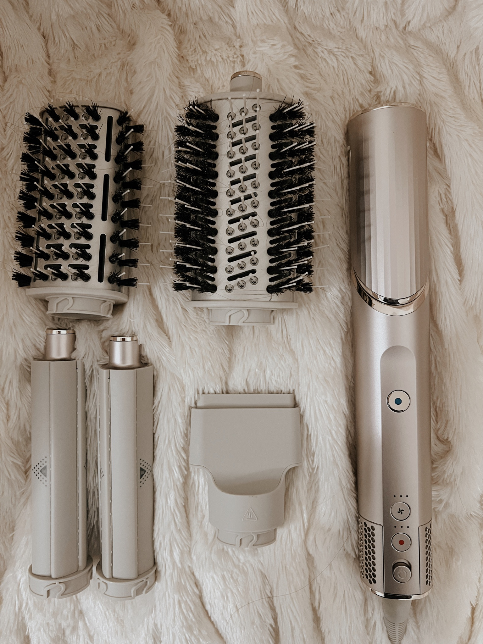 The Shark FlexStyle is the best alternative to the Dyson Air Wrap. Half the price, easy to use and a little bit more powerful.  Full review on my blog royallypink.com 

#LTKbeauty