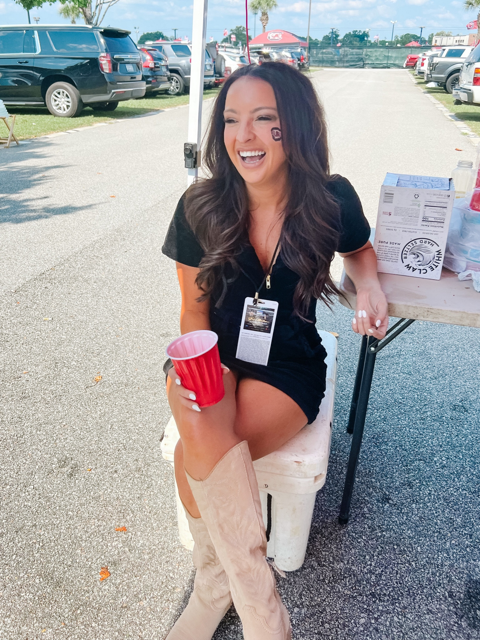Gameday. South Carolina gamecocks. Gameday dress. College football outfit. Football game day. Tailgate. Black corduroy dress. Black and gold. Cowgirl boots. Nude knee high boots. Fall dress. 

#LTKstyletip #LTKSeasonal #LTKU