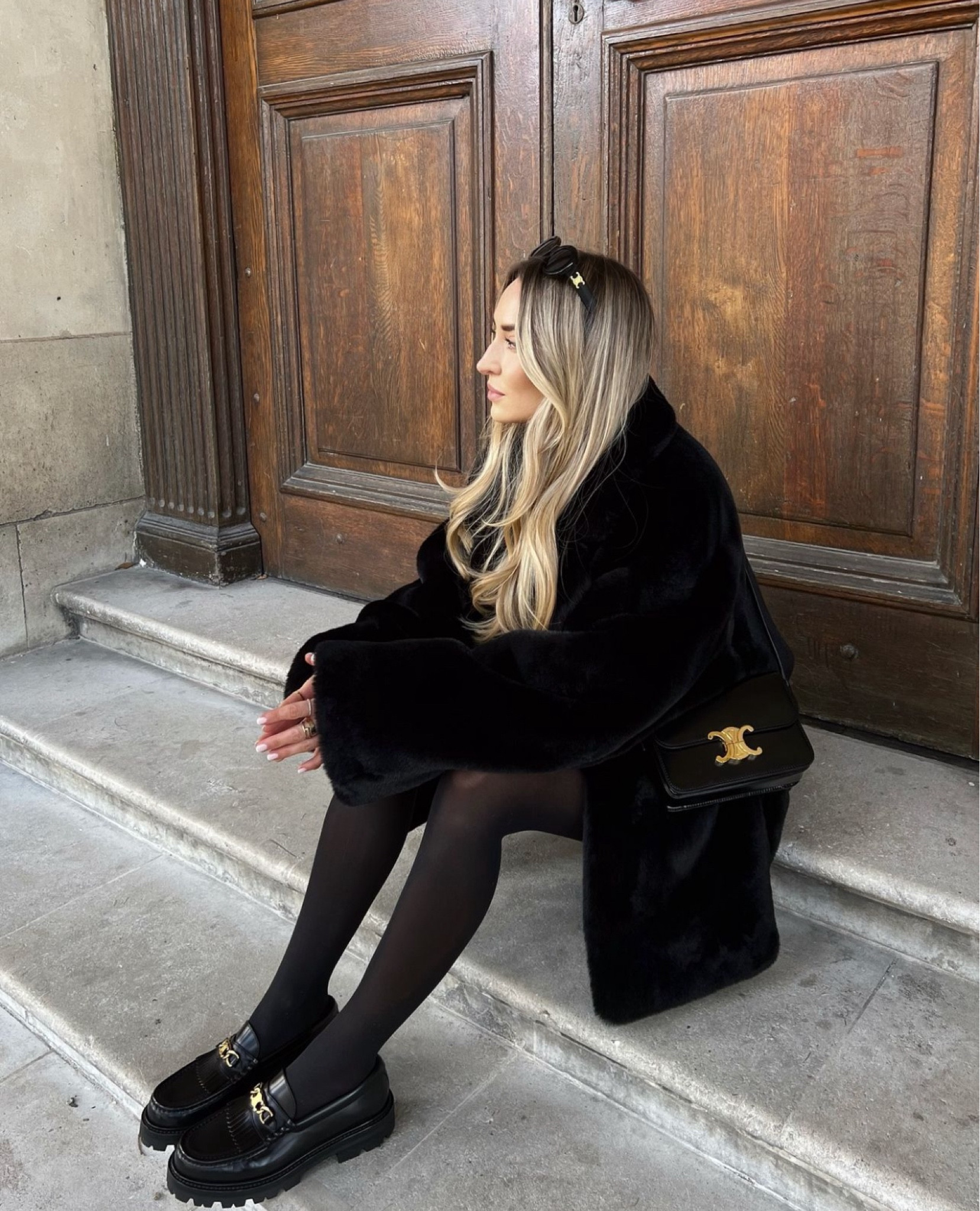 Black faux fur coat styled with oversized knitwear, Celine accessories and loafers for a preppy city autumn look

#FashionMonth #LTKautumn