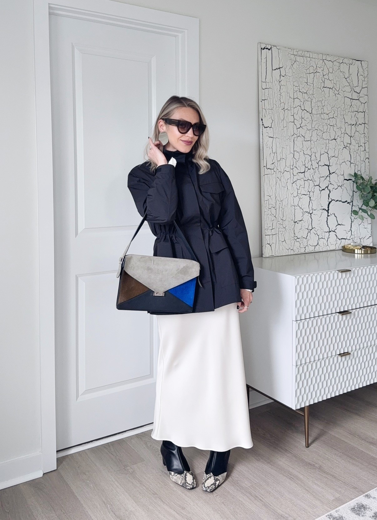 Drawstring windbreaker and satin skirt, a bit of colorblock and a bit of snake print🖤💙🤍
Linking outfit details below👌🏼

#LTKSeasonal #LTKOver40 #LTKdayinmylife