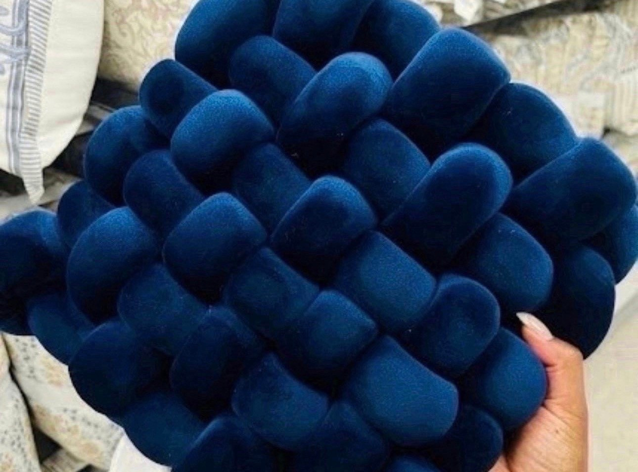 It’s all in the details! 💙 This deep navy woven knot pillow adds the perfect pop of color and texture to any sofa or bed. That velvet finish is incredibly soft and looks so expensive.

#LTKHome