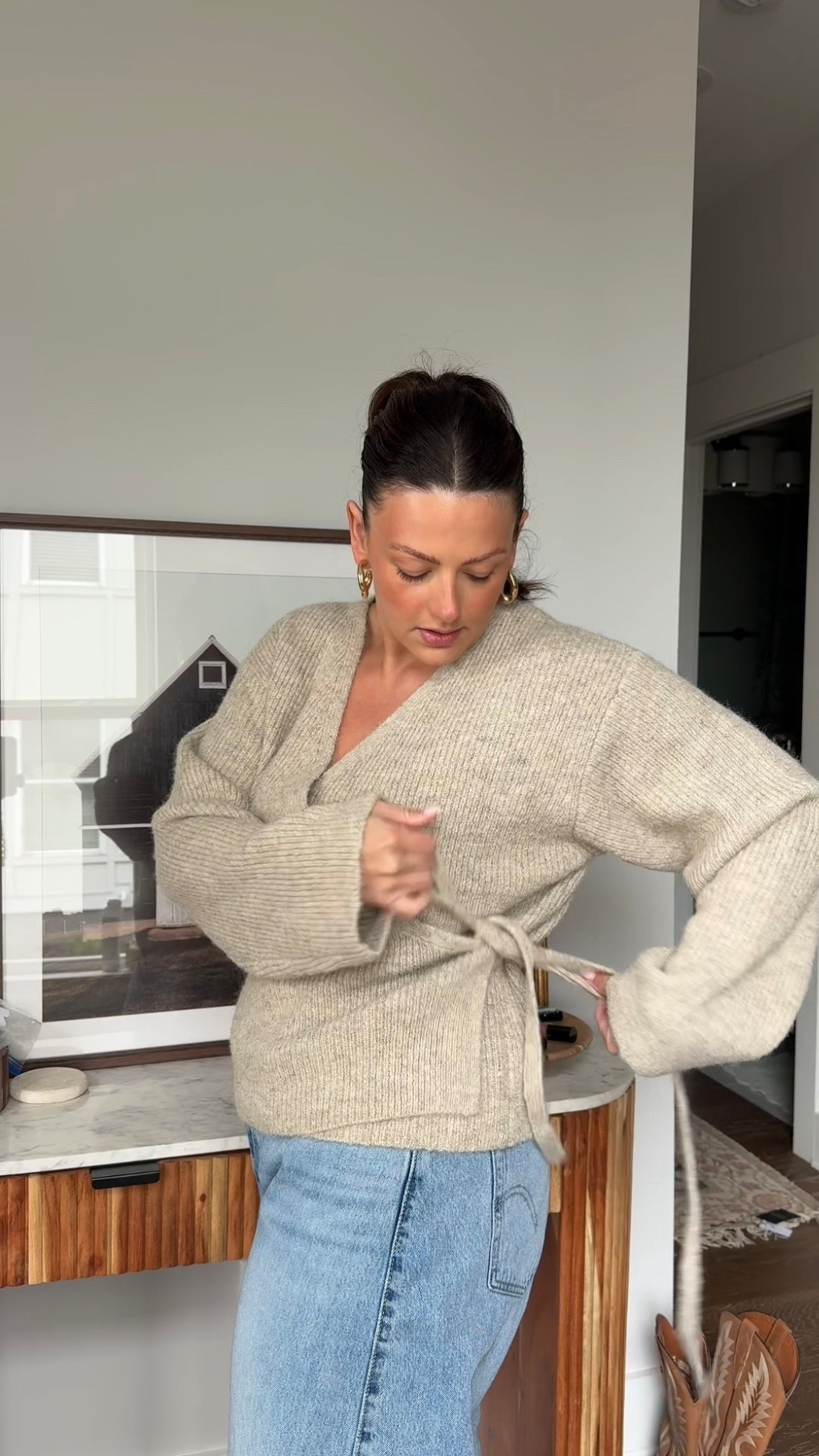 The softest and cutest wrap sweater!! Wearing a XL! Obsessed for a chic winter look! Pair with jeans and boots! Revolve outfit inspo flattering waist outfit night out date night 

#LTKHoliday #LTKgrwm #LTKSeasonal