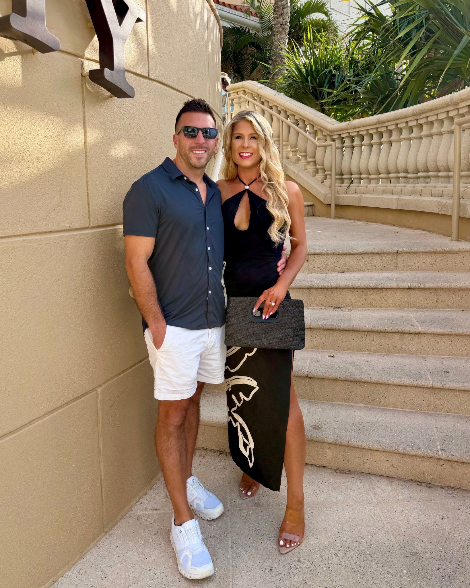 Black Halter Dress with floral design + side slit styled as a resort dress, summer date night dress, or vacation dress. 

Maxi dress, tropical dress, black dress, summer dress, resortwear 2026, floral dress @Revolve 

#LTKTravel #LTKSaleAlert #LTKootd