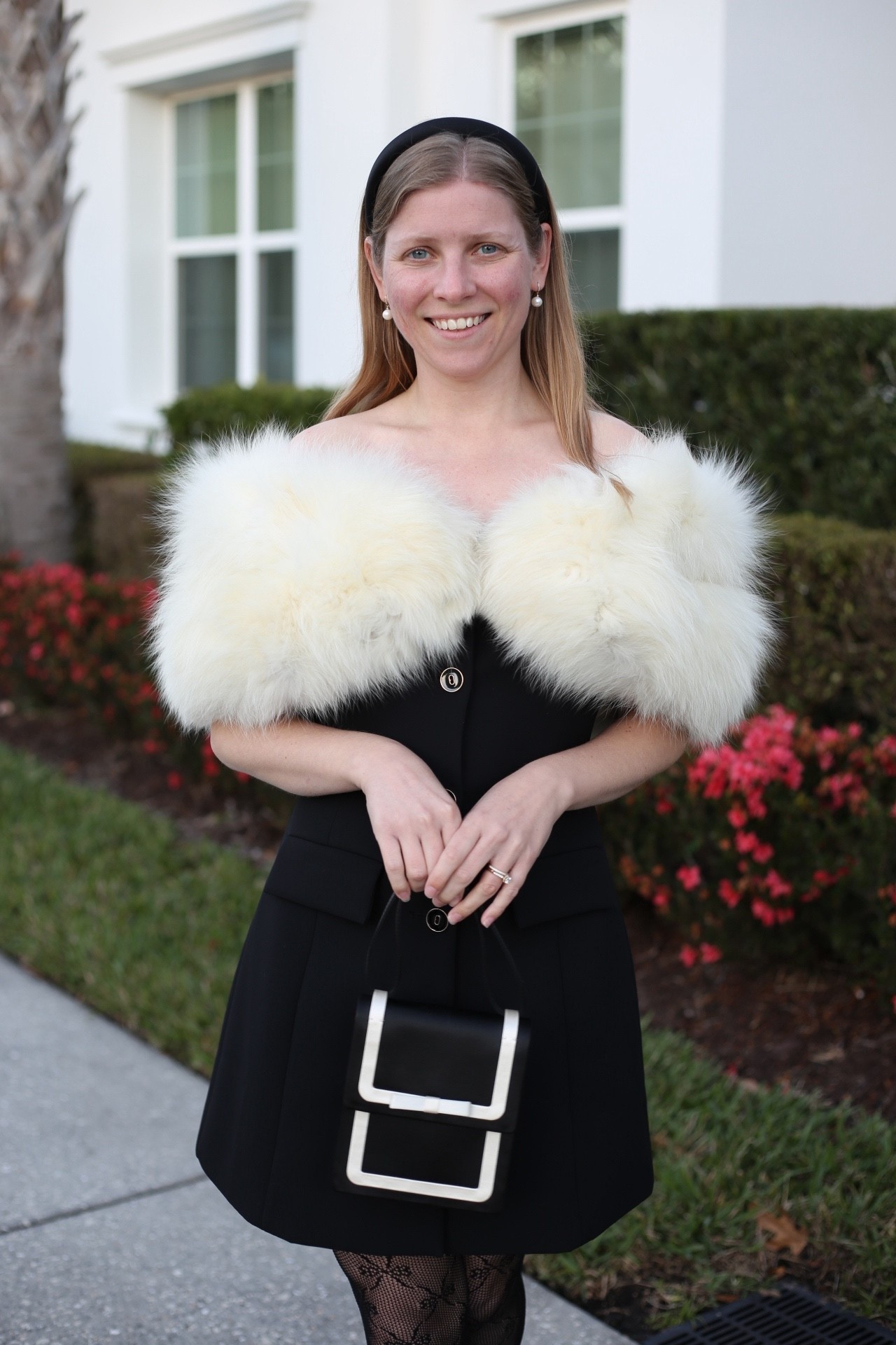 When Florida gets chilly the family heirloom comes out. A classy evening out at a local jazz club is exactly what this tailored off the shoulder mini dress from Hill House was made for. Runs TTS  