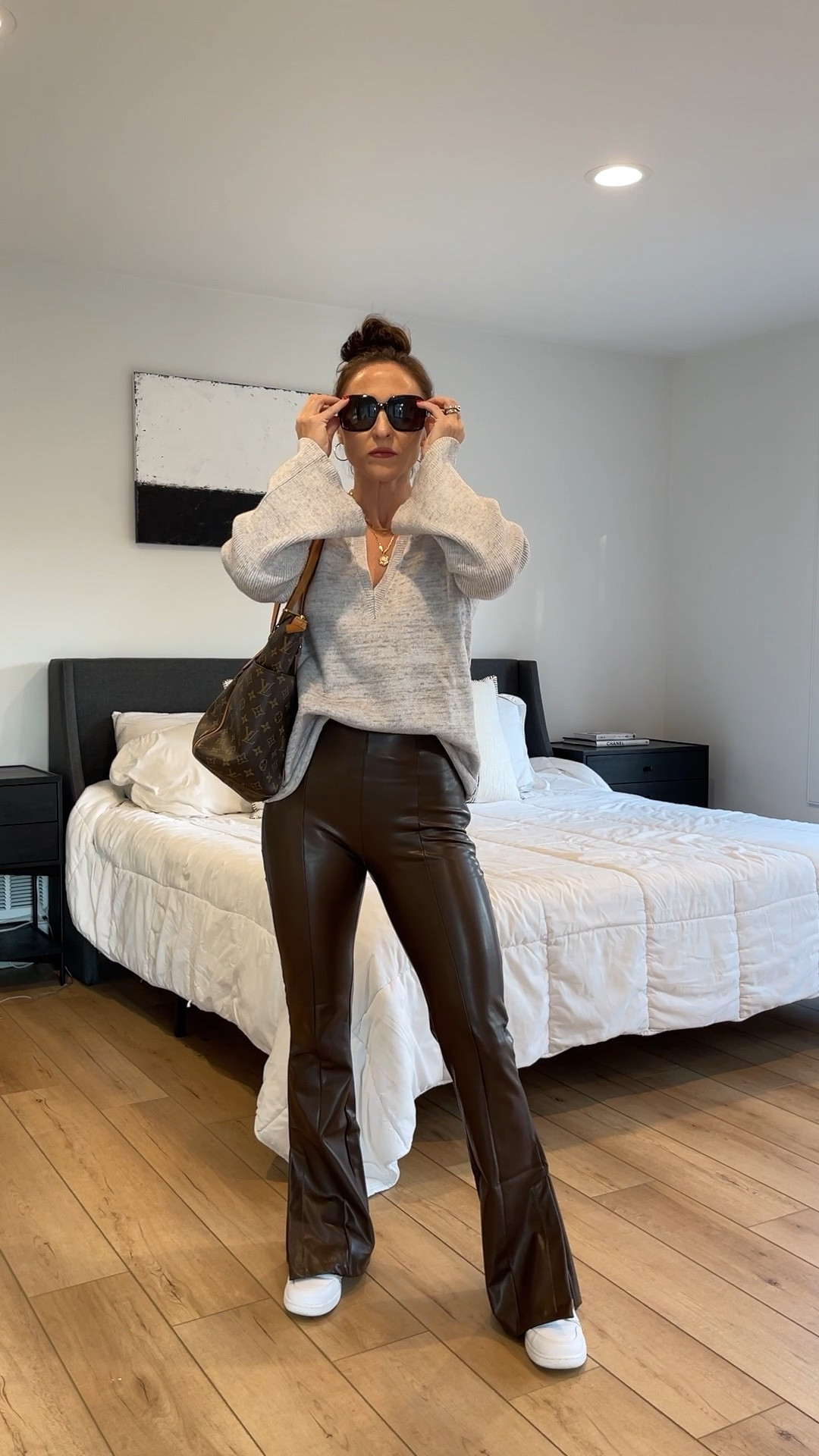 Chic and comfy outfit idea
Faux leather pants 
Sneakers 
Deep v sweater 

#LTKunder50 #LTKshoecrush #LTKsalealert