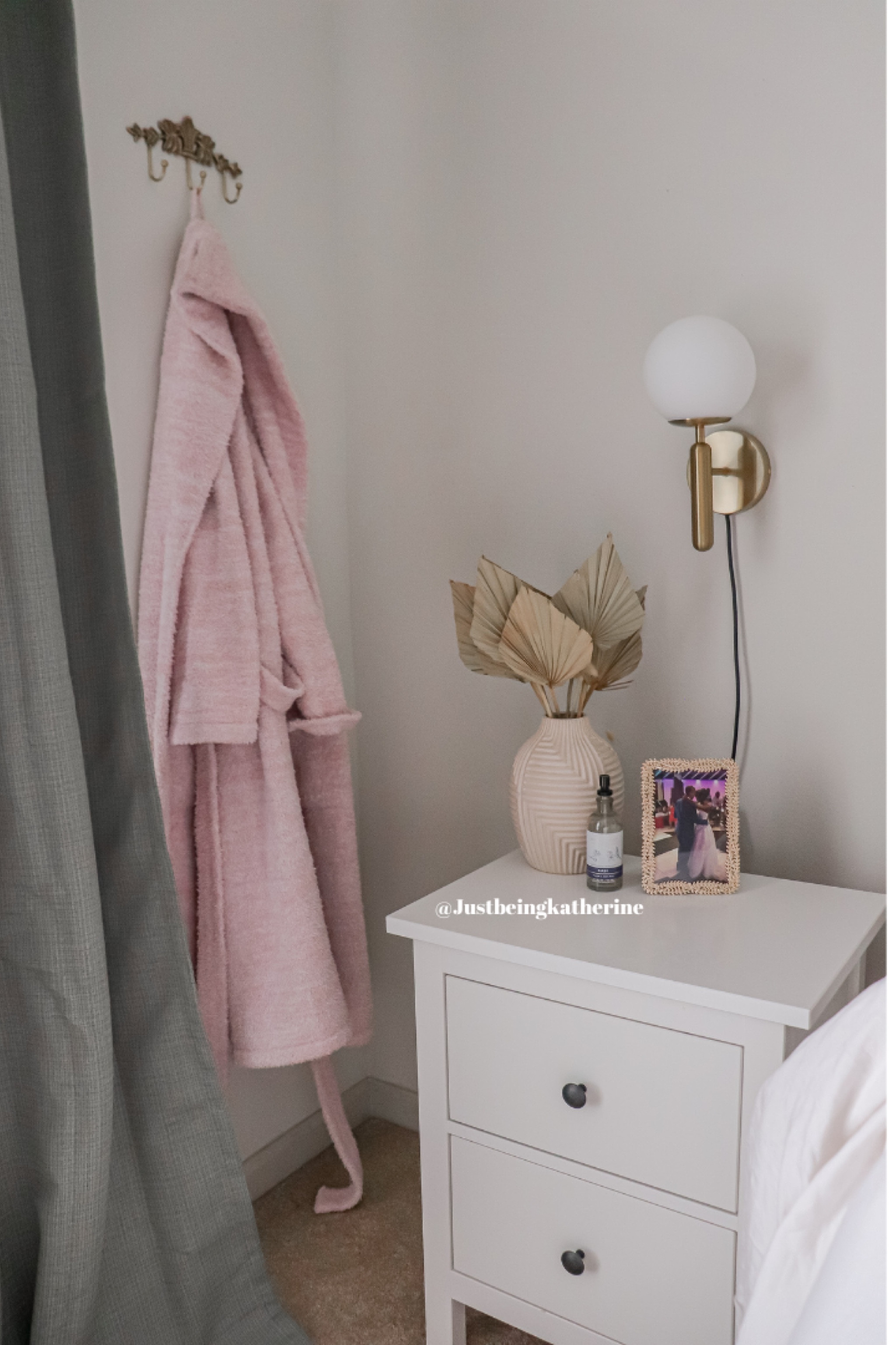 Bedroom nook

Hanging rack and wall sconces 

#LTKHome