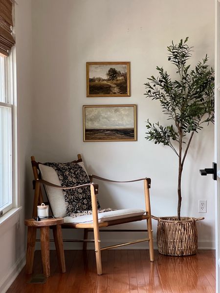 Vintage art, Stanton chair, campaign chair, cozy corner, rattan blinds, olive tree 

#LTKsalealert #LTKhome