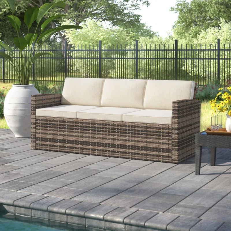 Silloth 71.5'' Wide Outdoor Wicker Patio Sofa with Cushions | Wayfair North America
