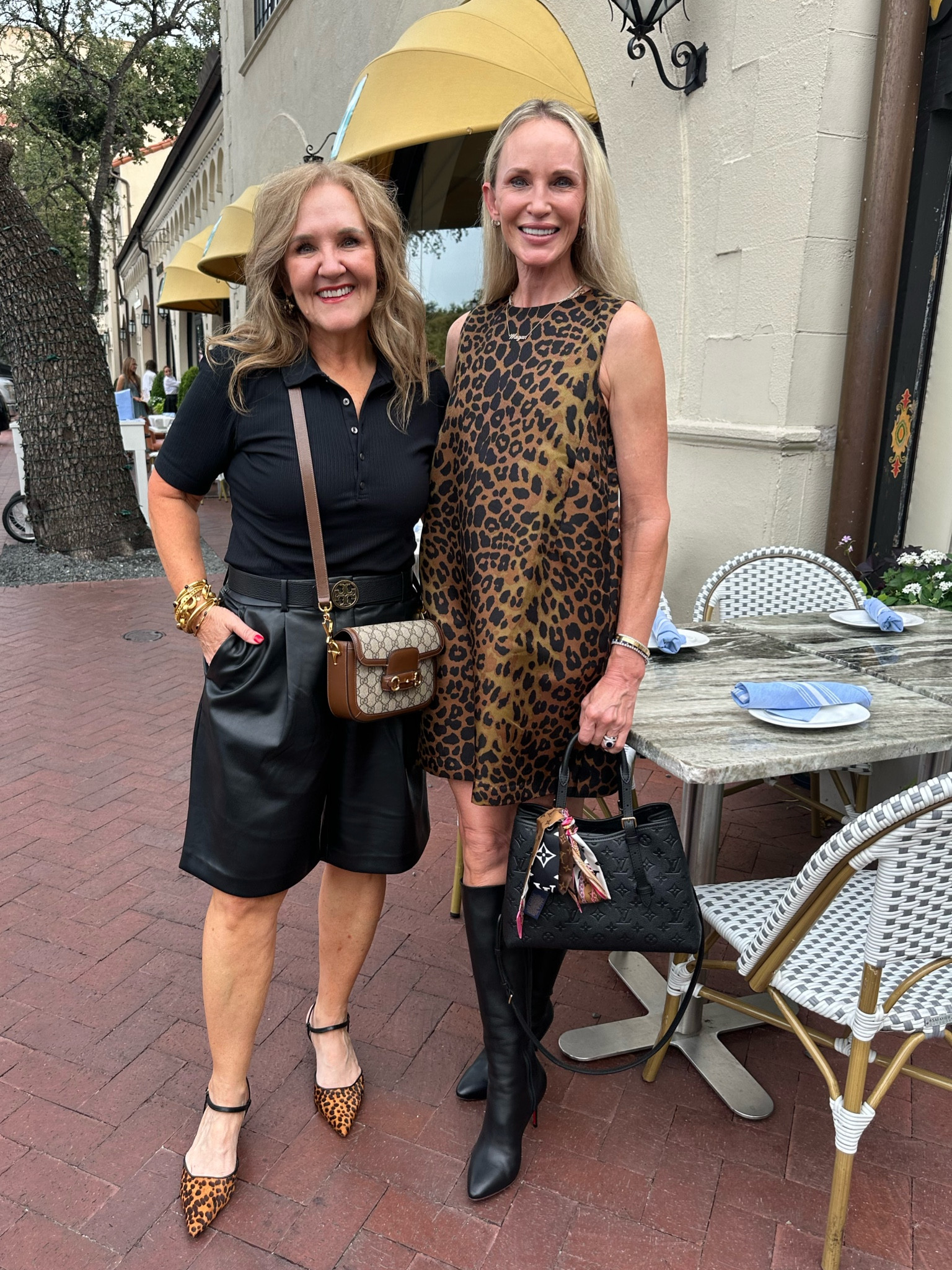Loved meeting meganlifestyleblog in person. Her dress was fabulous! Had to share! 

Faux leather shorts size 10
Spanx polo size large 15% off code NANETTEXSPANX 

My shoes are tts and pretty comfy. Gold jewelry by Julie Vos 

Loft black shorts fall outfit leopard dress Tuckernuck 

#LTKMidsize #LTKCon #LTKParties