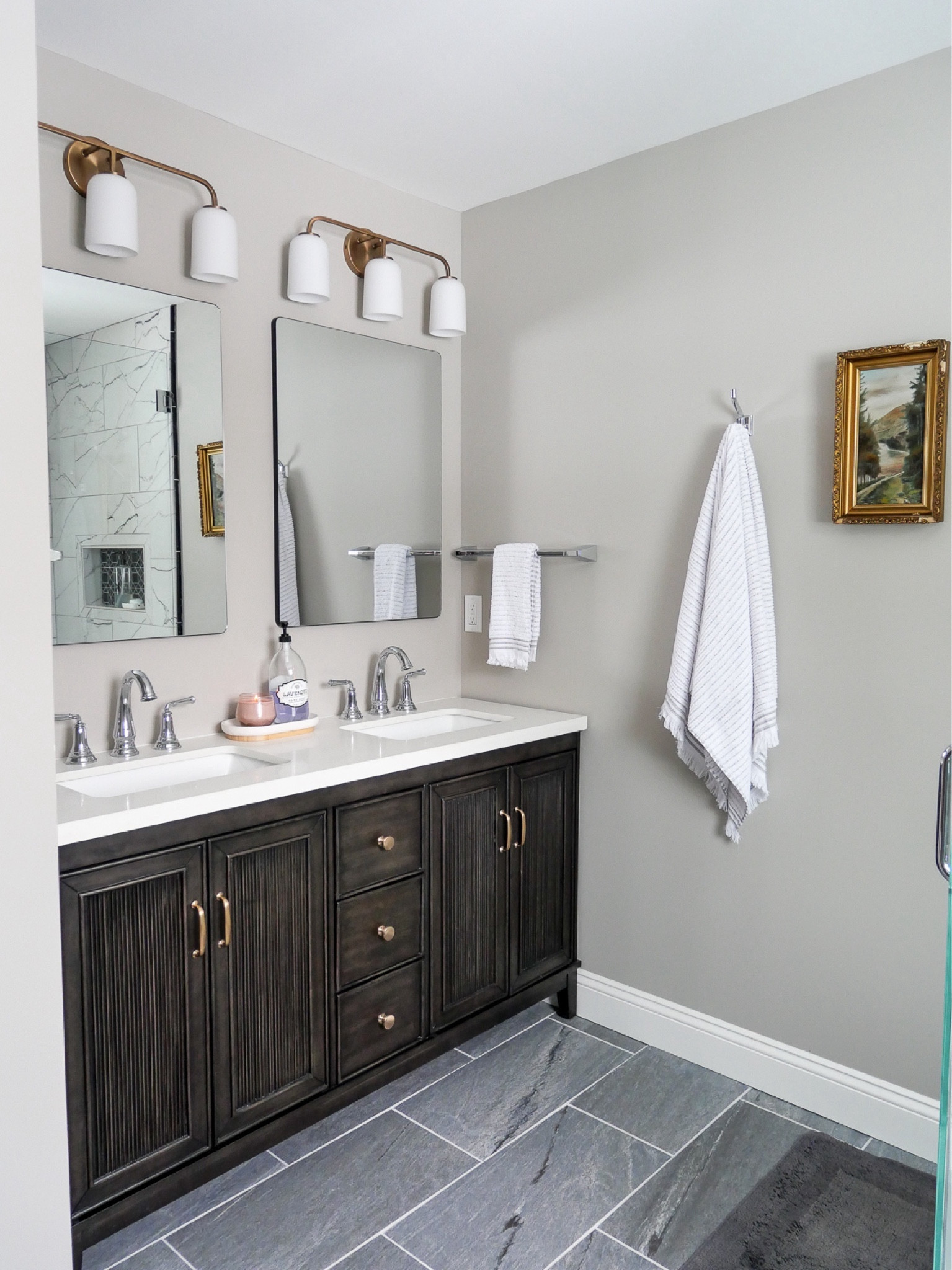 Bathroom is complete! I love how the hardware swap on the bathroom vanity makes it more my own. And these hooks and towel bars are perfection  

#LTKfindsunder100 #LTKfindsunder50 #LTKhome