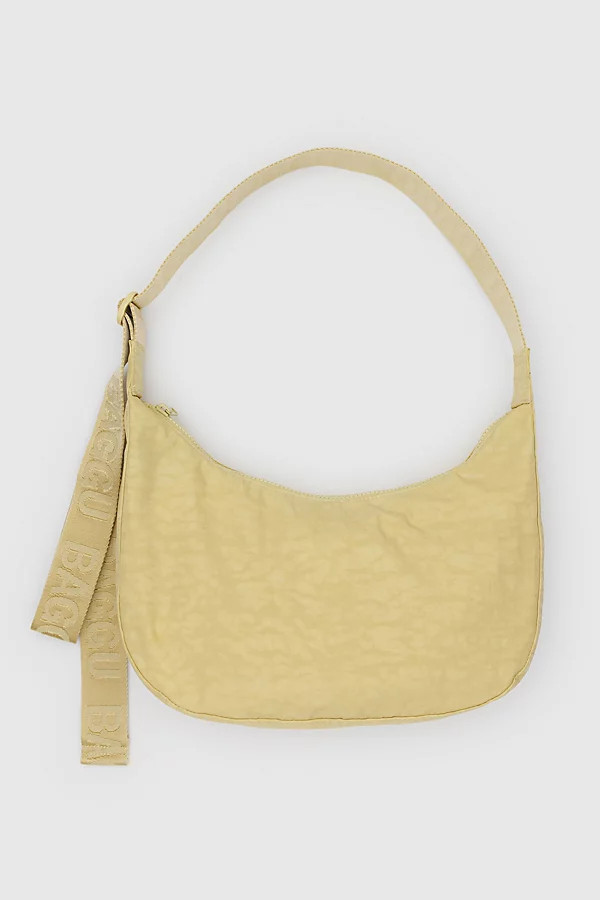 BAGGU Medium Nylon Crescent Bag in Butter at Urban Outfitters | Urban Outfitters (US and RoW)