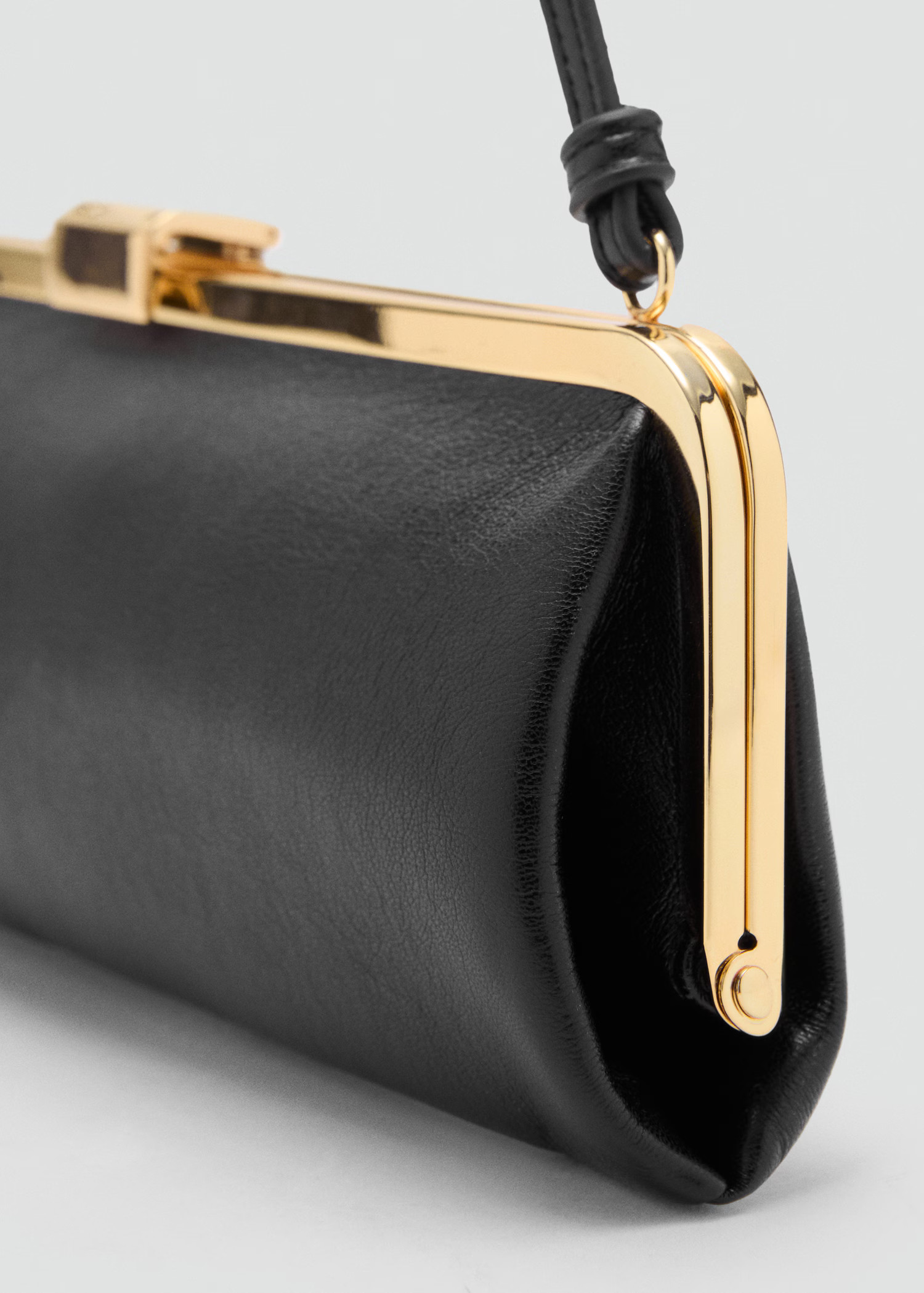 Metallic clutch handbag | MANGO (UK)
