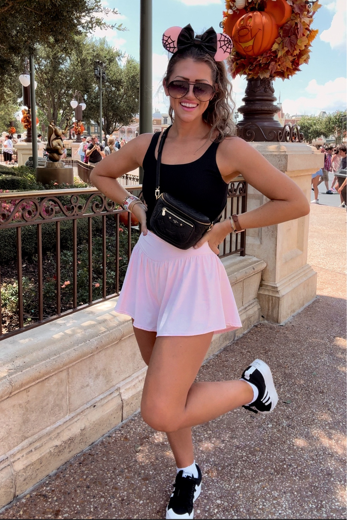Disney outfit 🕷️🕸️💕 

Amazon shorts size S (true to size) - these are sooo cute and comfy! I love the crossover waistband. Size M sports bra. Love the ribbed texture on this one! For shoe reference: I LOVE these adidas in the fall!!! I wore them a lot last year. I’m in between 8/8.5 in shoes, but tend to gravitate more towards 8.5 in sneakers I feel like… in this pair, I did an 8. I feel like they run a lil big if you’re in between sizes like me FYI! Ruffle socks are Old Navy and sooo cute and comfy  


Disney outfit ideas
Florida
What to wear
Halloween
Disney style
Disney moms
Disney outfit inspo 
Fall outfit 
Activewear
Athleisure 
