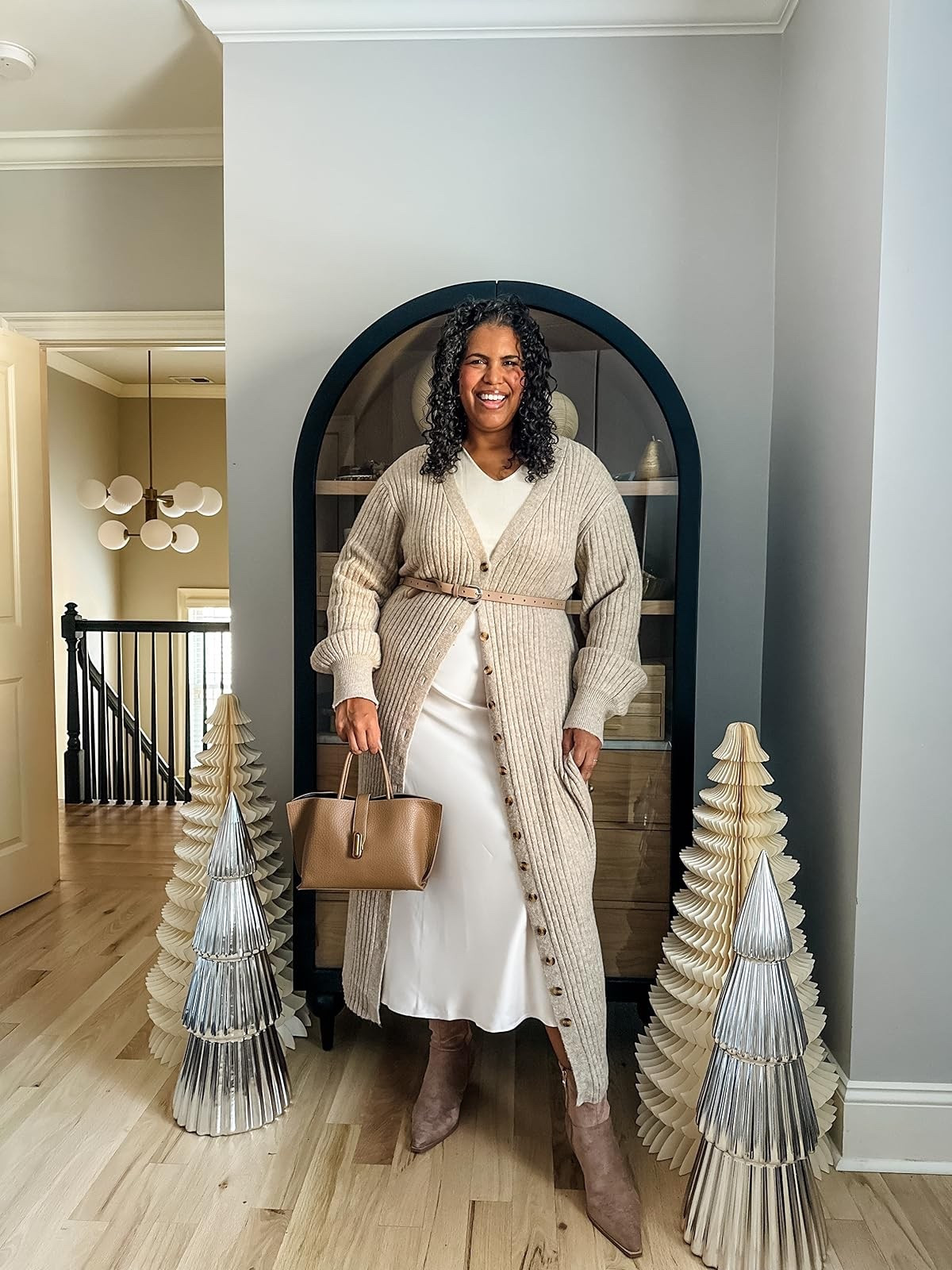 Wearing size xxl in skirt and both sweaters! The bottom one is thin enough to tuck. Super chic and comfy.

#LTKHoliday #LTKSeasonal #LTKGiftGuide