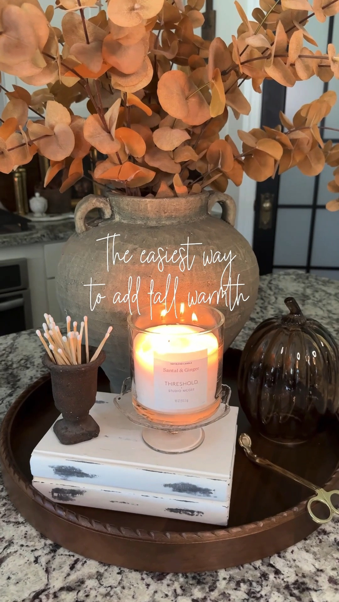 Fall Tray Styling!!
Love the warmth of this styling. Perfect on your island, coffee table, or dinner table. I was able to source a few mini urns and vintage crystal compotes.

Wood tray, large brown vase, toasted eucalyptus, amber glass pumpkin, mini urn, white matches, styling books, vintage crystal compotes, gold wick trimmer, candle

#LTKHome #LTKSeasonal #LTKstorytime