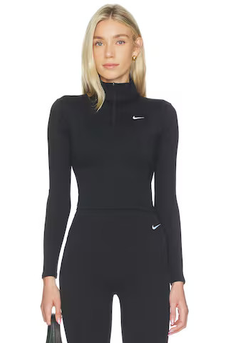Nike Dri Fit 1/4 Zip Mid Layer Top in Black & White from Revolve.com | Revolve Clothing (Global)