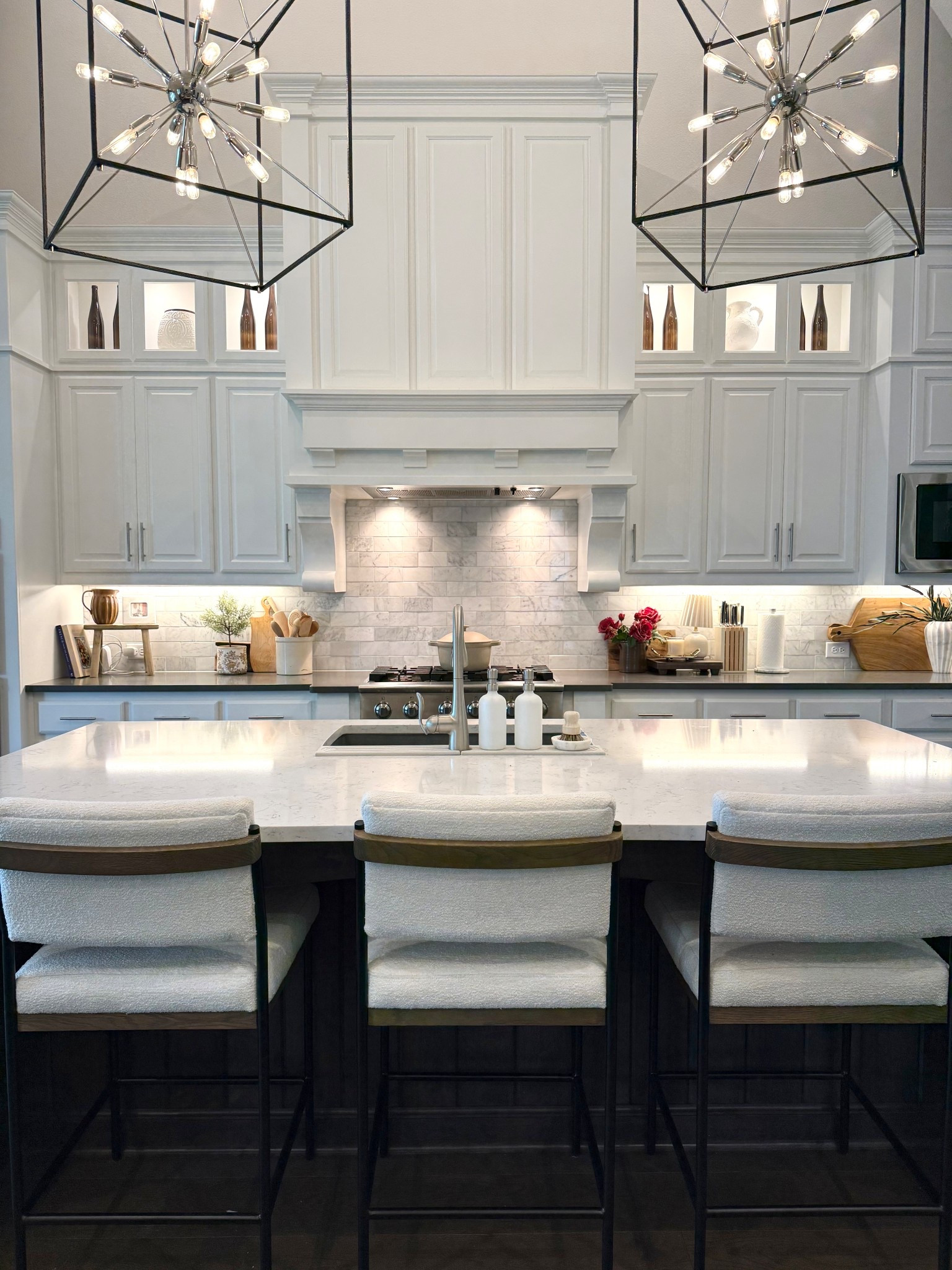 When we first moved in my house looked like a black and white movie (and I loved it 😂). Now I’m craving a more timeless, layered, neutral look but I refuse to renovate to get there! Getting a warm and inviting feel is all about balancing tones and layers!

If this is your vibe follow along as I share more of my home and favorite finds! 😊
.
.
.

#homeinspo #kitcheninspiration #kitchendecor #homeswithpurpose #walltowallstyle #whitekitchen #whiteandgreyhome #neutralhomedecor #inspiremehomedecor #luxurykitchen 

Two toned kitchen, white cabinets, grey counters, kitchen inspiration, kitchen statement lighting, transitional home, modern organic, timeless decor, studio McGee

#LTKHome #LTKSeasonal #LTKFamily