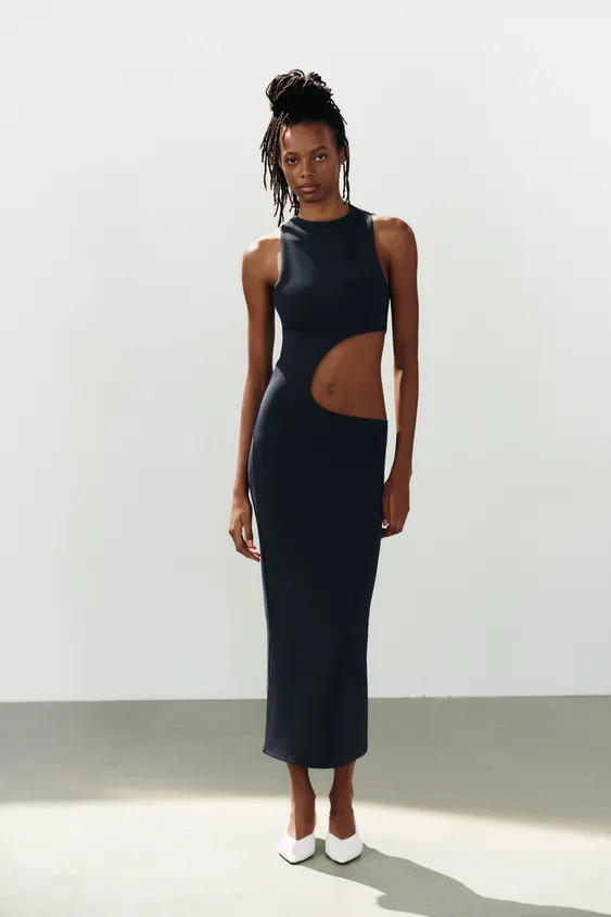 Dress made of stretch fabric. Straight neckline and sleeveless. Side slit detail. | Zara US