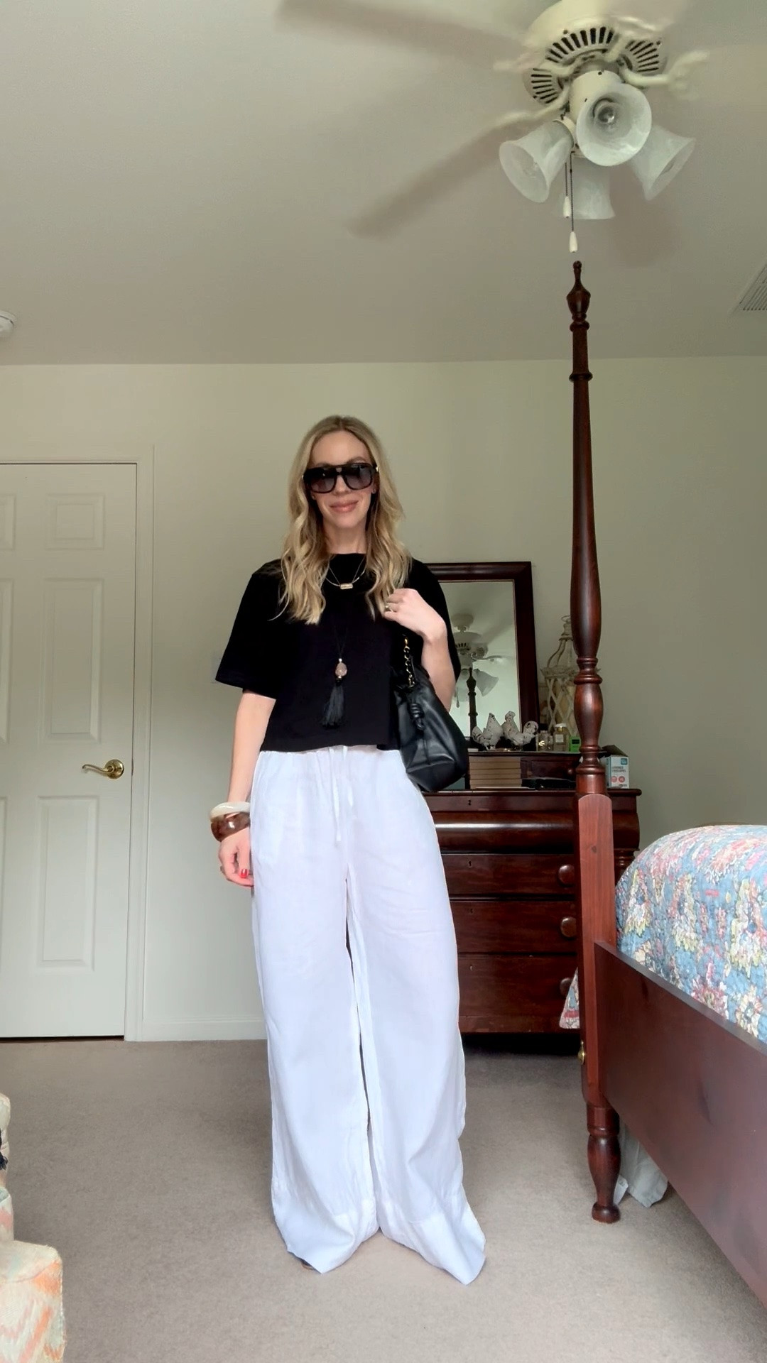 Summer vacation outfit with black cropped tee, white wide leg linen pants, Amazon jelly shoes, beaded pendant necklace

#LTKTravel #LTKOver40 #LTKSaleAlert