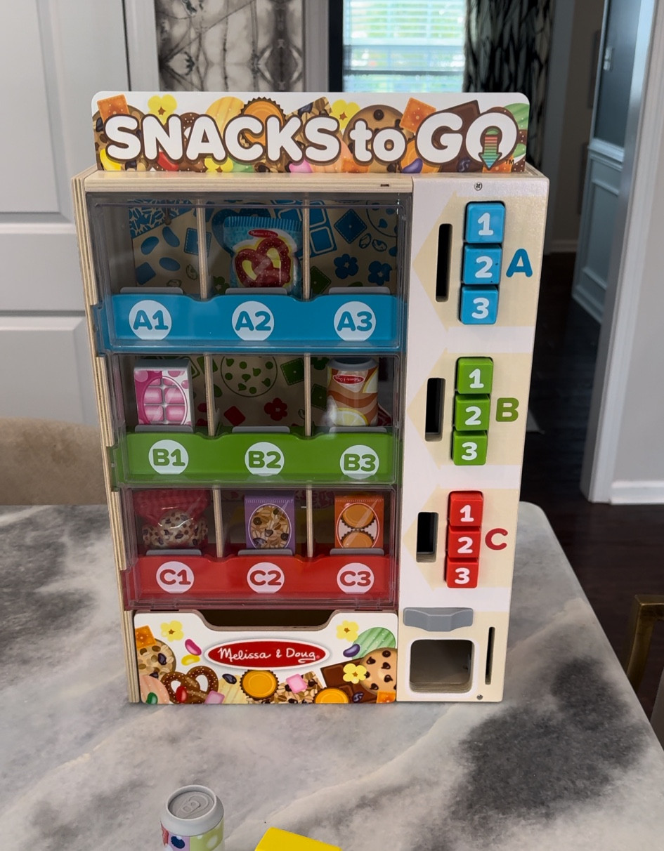 Their own personal vending machine for kids.  I love that it’s an education toy as well using ABC & 123.  It’s also the perfect size for actual snacks too if you want to swap it out for real food! 