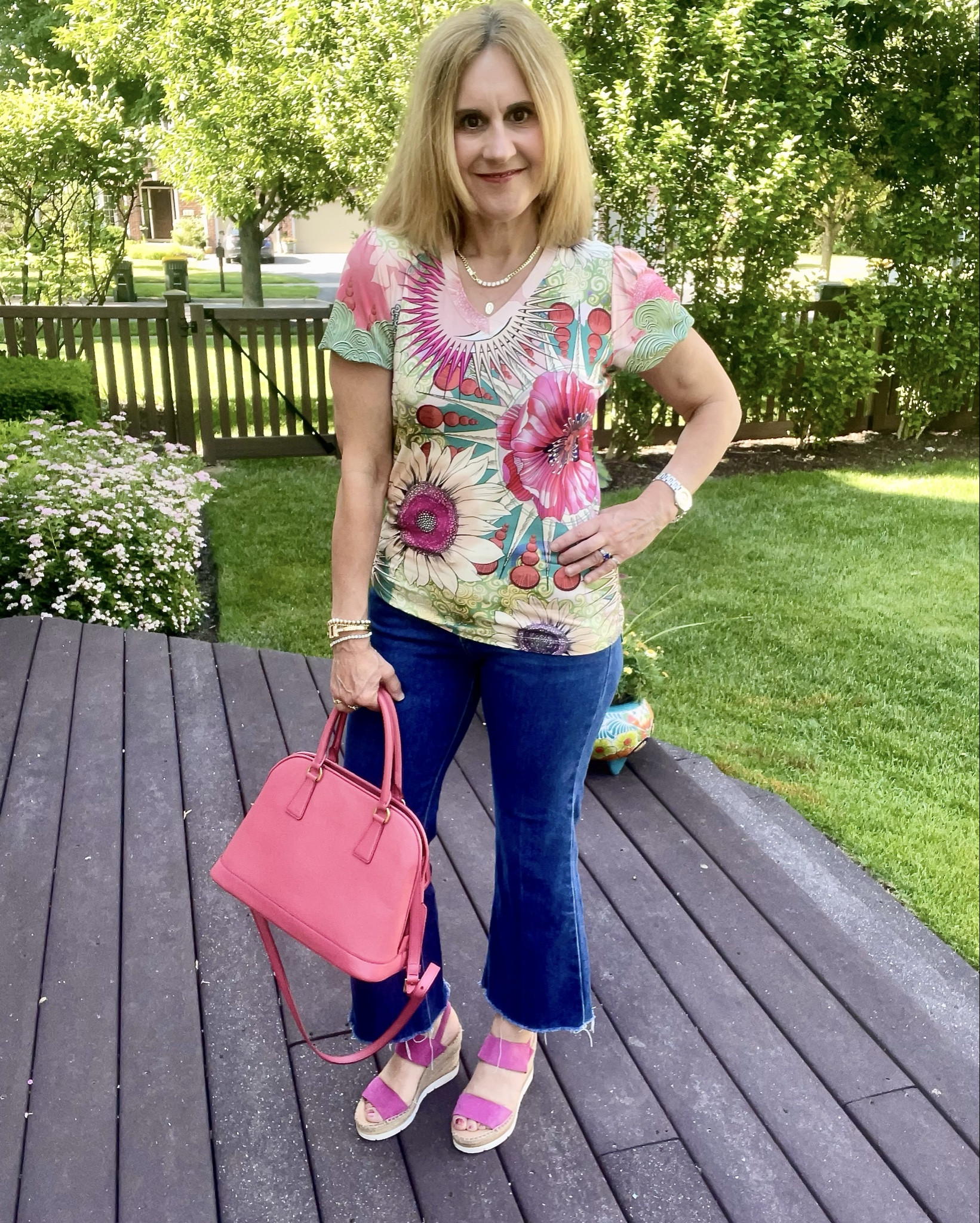 Sharing ways to style this vibrant floral tee for summer. 🌺🌿🌸 This gorgeous top will brighten up all your summer basics.  I paired it with crop flare jeans, wide leg pants, and a cotton mini skirt.  What look is your fave? 

#LTKOver40 #LTKSummerEdit #LTKStyleTip