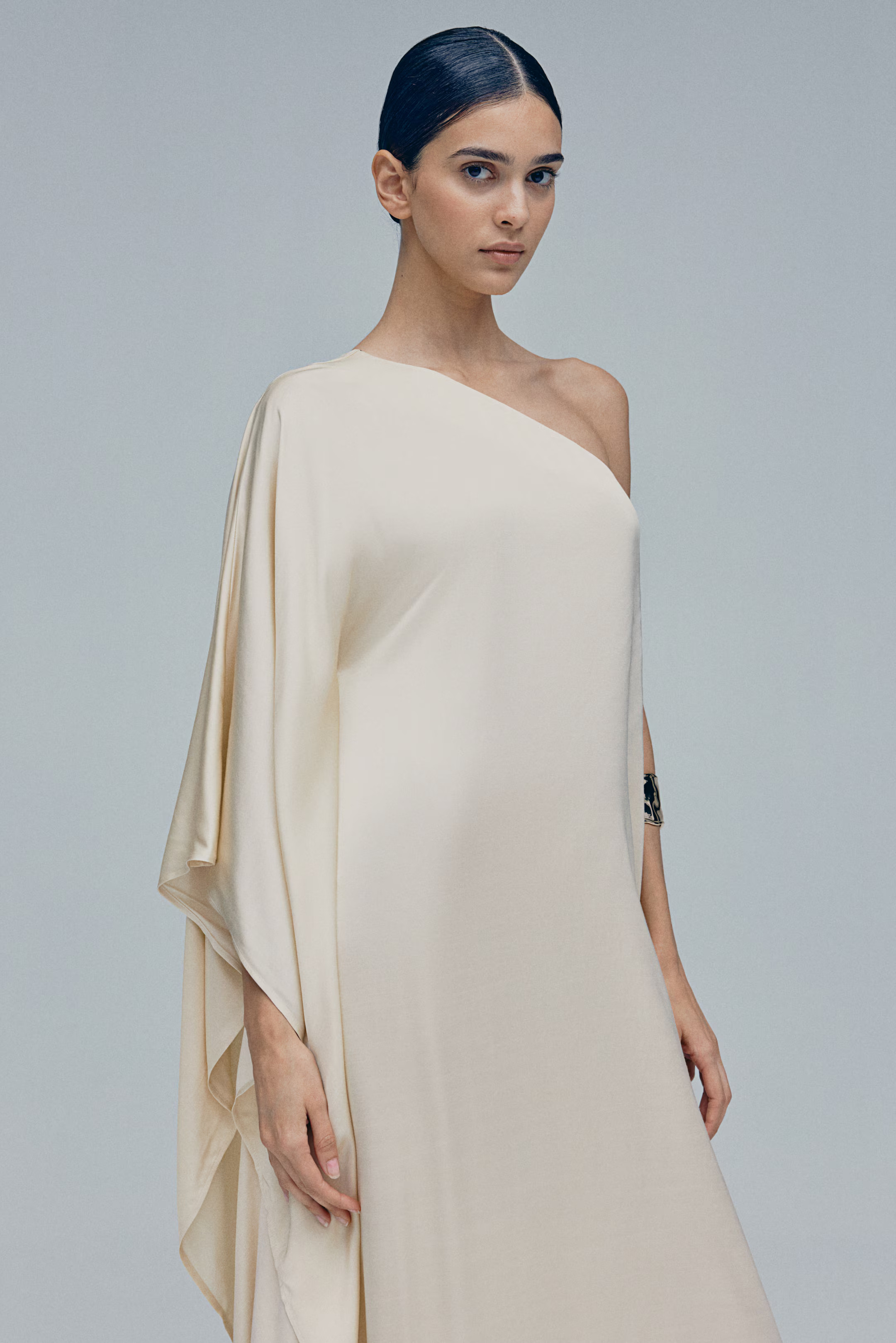 One-shoulder cape-sleeve dress | H&M (UK, MY, IN, SG, PH, TW, HK)