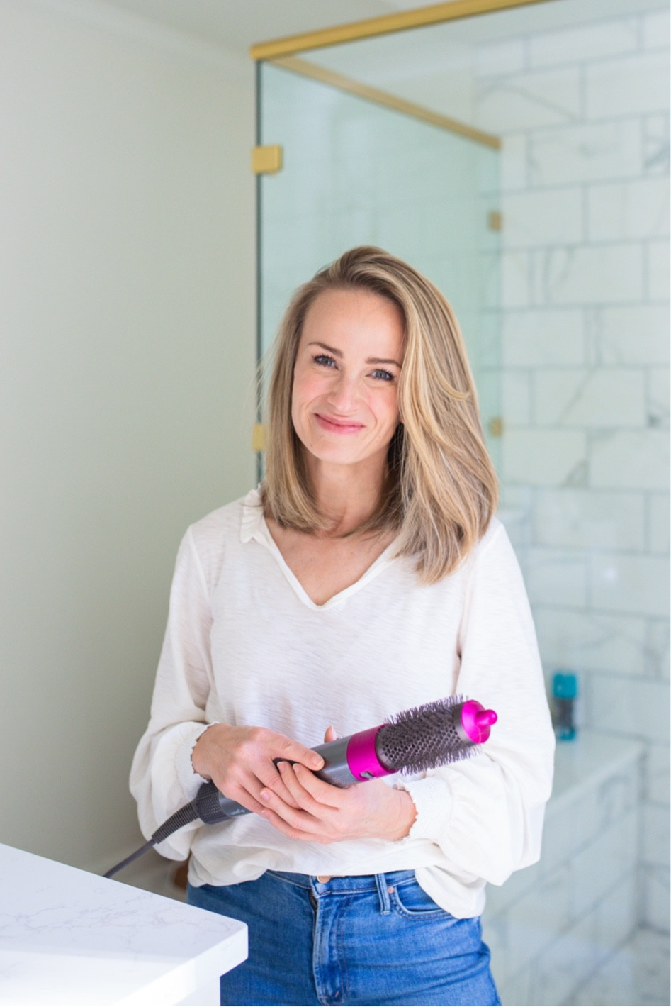 I truly LOVE the Dyson Airwrap. While it’s very pricey and hard to find in stock, it’s well worth it if you can get your hands on one. I specifically love how easy it is for me to create a salon-style blowout at home, anytime I want. Another thing I love about the Dyson Airwrap is that it’s powerful enough to dry my hair fully without using extreme heat.

#LTKbeauty #LTKstyletip