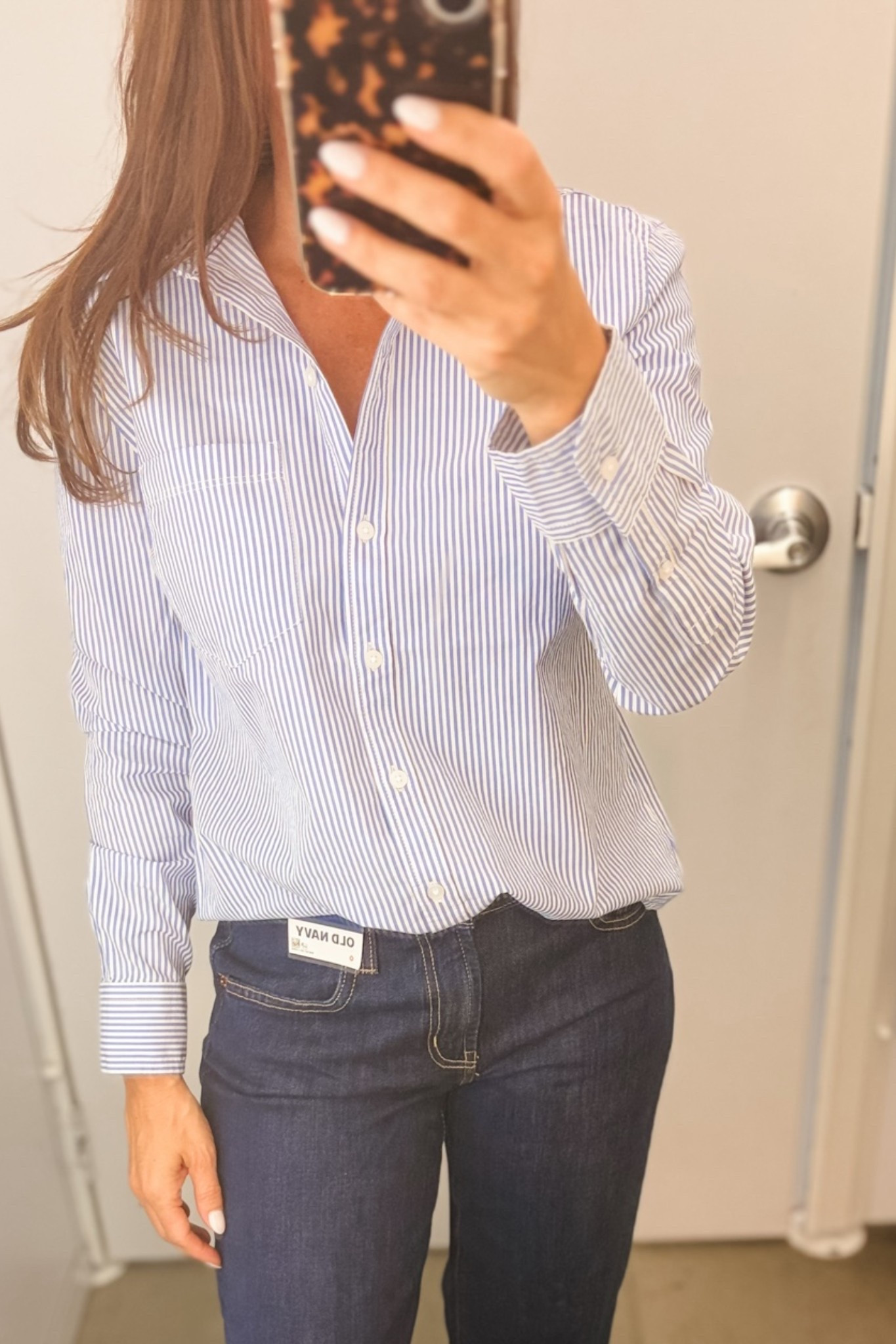 Old Navy Button down in blue stripes.  It is not cropped  but a shorter button down and runs true to size.

#LTKOver40 #LTKSeasonal #LTKSaleAlert