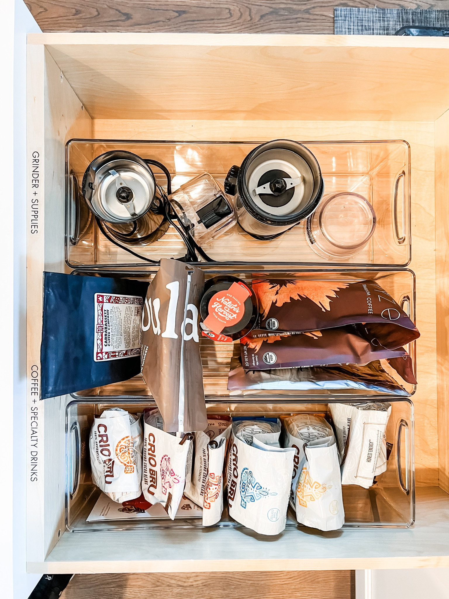 This tea + coffee station includes a cabinet for mugs and larger items like a kettle. Then, there’s two drawers below. One - holds all the tea esssentials. And this drawer holds larger coffee essentials like grinders and bags of coffee beans. This client now has all their tea and coffee must haves in one spot in their kitchen! 

#LTKhome #LTKSeasonal #LTKfamily