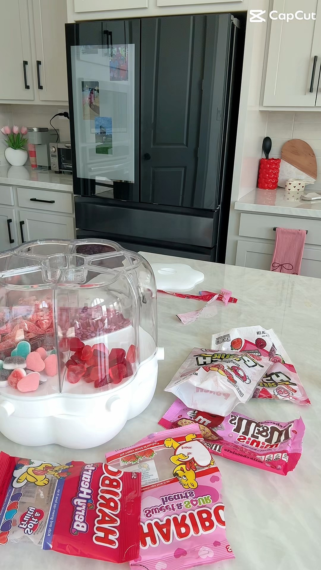Valentine’s candy station loading 💕 This dispenser makes snack time way more fun and keeps all our favorites in one cute spot. Linked everything here 🤍

#LTKvlog #LTKValentine #LTKHome