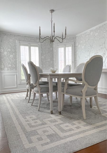 Monochromatic Grandmillennial Dining Room with gray & cream scallop upholstered chairs, Greek key rug, French inspired chandelier, modern white oak dining table & silver chinoiserie wall paper. Formal Dining Room, Traditional, Home Decor, Elegant, Modern Victorian

#LTKSale #LTKhome #LTKsalealert
