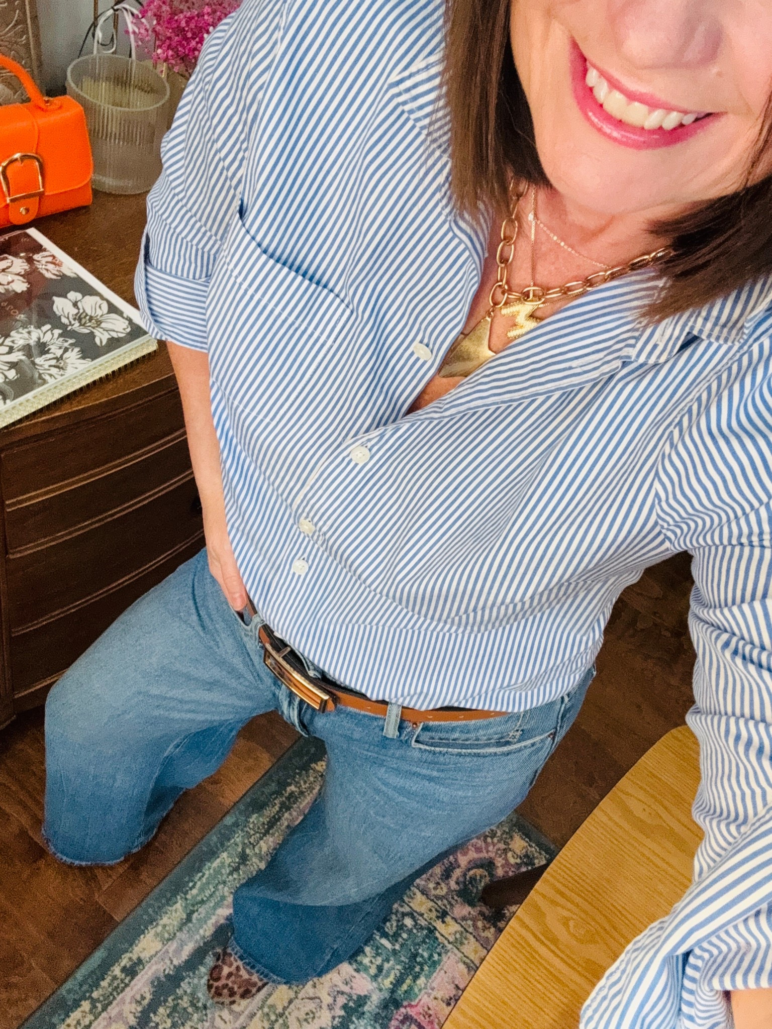 My work from home OOTD!!

Blue and white pinstriped shirt
Wide Leg
Jeans
Trench coat 

#LTKOver40 #LTKootd #LTKgrwm