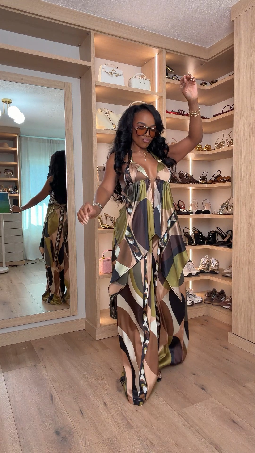 Scroll to shop this statement maxi dress featuring a bold abstract print with earthy tones and a flowy silhouette that moves beautifully. The halter neckline and lightweight fabric create an effortlessly elegant look that feels both elevated and vacation-ready.

Perfect for vacations, resort dinners, summer events, beach nights, or tropical getaways.

5'4" | 138 lbs | 34D bust | 27" waist | 40" hips

#LTKSpringSale #LTKvlog #LTKootd