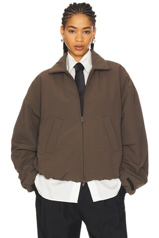 Fear of God ESSENTIALS Bomber Jacket in Brown from Revolve.com | Revolve Clothing (Global)