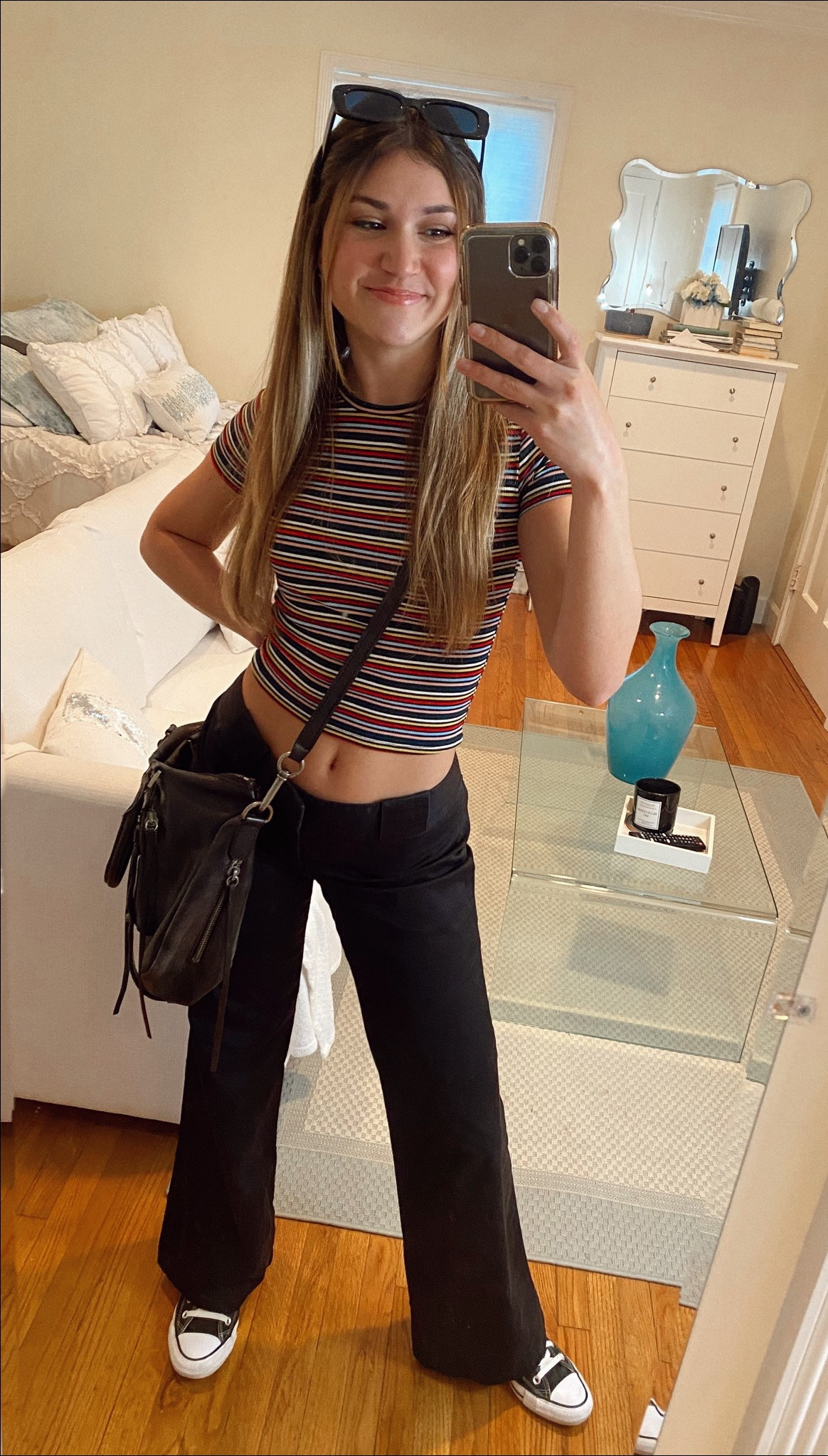 Casual transition to spring outfit! I am wearing a striped shirt with low rise trousers and converse! 

#LTKstyletip #LTKfit #LTKSeasonal