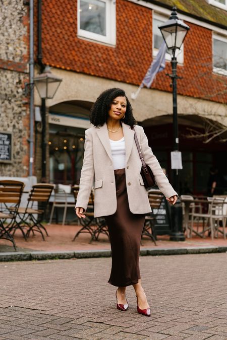 Transitional Spring Outfit: satin skirt, blazer and slingback heels. 

#LTKover40 #LTKeurope #LTKSeasonal