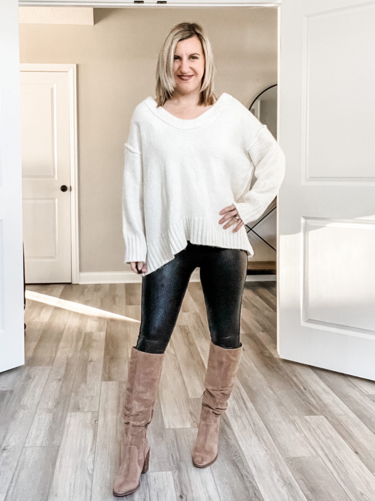 Another great oversized sweater to wear with your faux leather leggings if you’re looking for booty coverage. Wearing a small in both leggings and sweater. Fit tts
Christmas outfit, winter outfit

#LTKHoliday #LTKCyberweek #LTKSeasonal