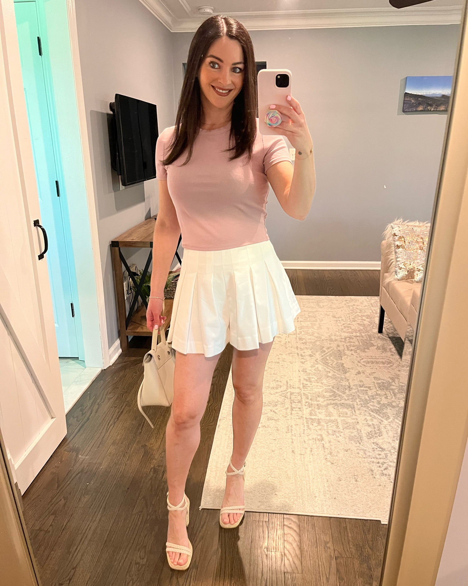 Spring outfit staple unlocked 🤍 These high waisted pleated trouser shorts instantly make any outfit look elevated and expensive. I’m obsessed with the flared silhouette that gives the look of a skirt while still being as comfortable and easy to wear as shorts. The tailored pleats, flowy fit, and high-waisted design are SO flattering and perfect for creating that chic, polished spring aesthetic ✨

I styled these white trouser shorts with a pastel pink top for the ultimate feminine spring outfit idea — perfect for brunch, vacation, date night, girls day, or just an elevated everyday look. They seriously look designer without the designer price tag 👏

If you’re looking for classy spring fashion, tailored shorts, quiet luxury outfit ideas, or affordable spring wardrobe staples, these are a must-have this season. 

Wearing a size small 🤍 shop now for 40% off! 🚨

@Meshki US 

#capsulewardrobe #springoutfits #styletip #petitestyle #petitefashion #LTKStyle #LTKSpring #SpringOutfits #TrouserShorts #QuietLuxuryStyle #SpringFashion #ElevatedBasics #CapsuleWardrobe #ClassyStyle #AffordableFashion

#LTKWedding #LTKPetite #LTKSaleAlert