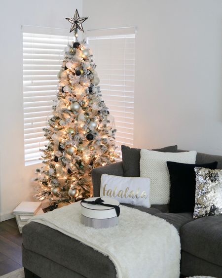 flocked white Christmas tree, black ornaments, black tree topper, gold ornaments, Holiday decor

#LTKSeasonal #LTKhome #LTKHoliday