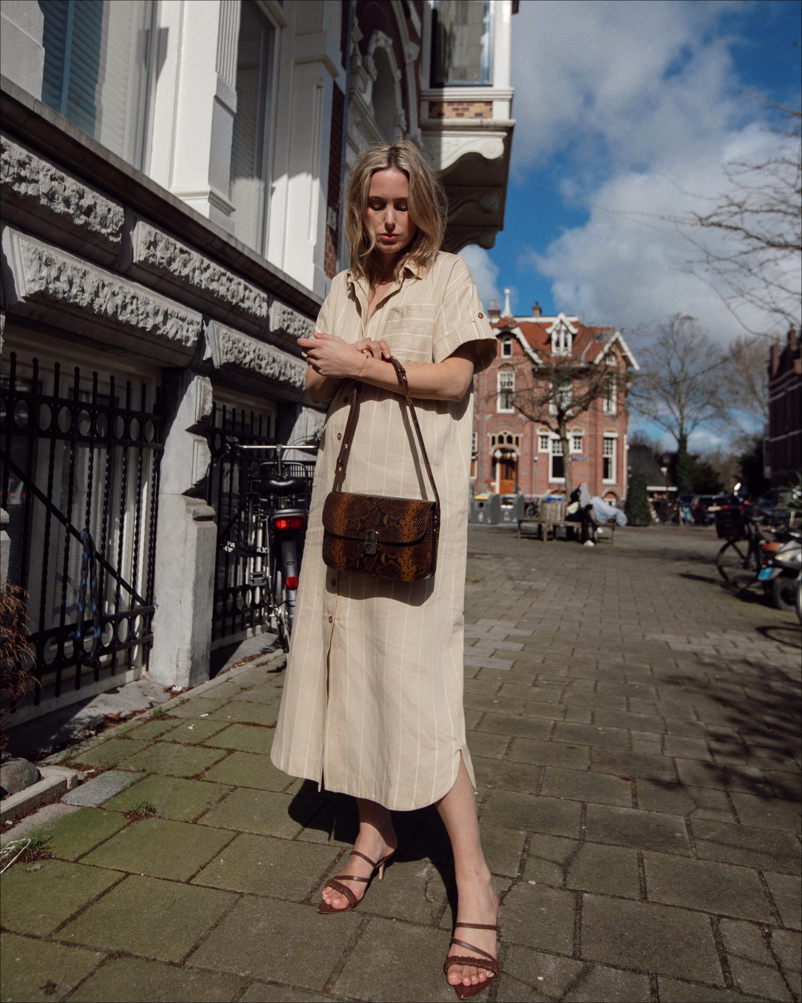 Sézane Alani Dress.

short sleeve midi dress, stripes, Elleme, heeled sandals, cross body leather bag, shoulder bag, python patterned, spring and summer outfit inspiration, classic style. 

#LTKSeasonal #LTKbump #LTKfit