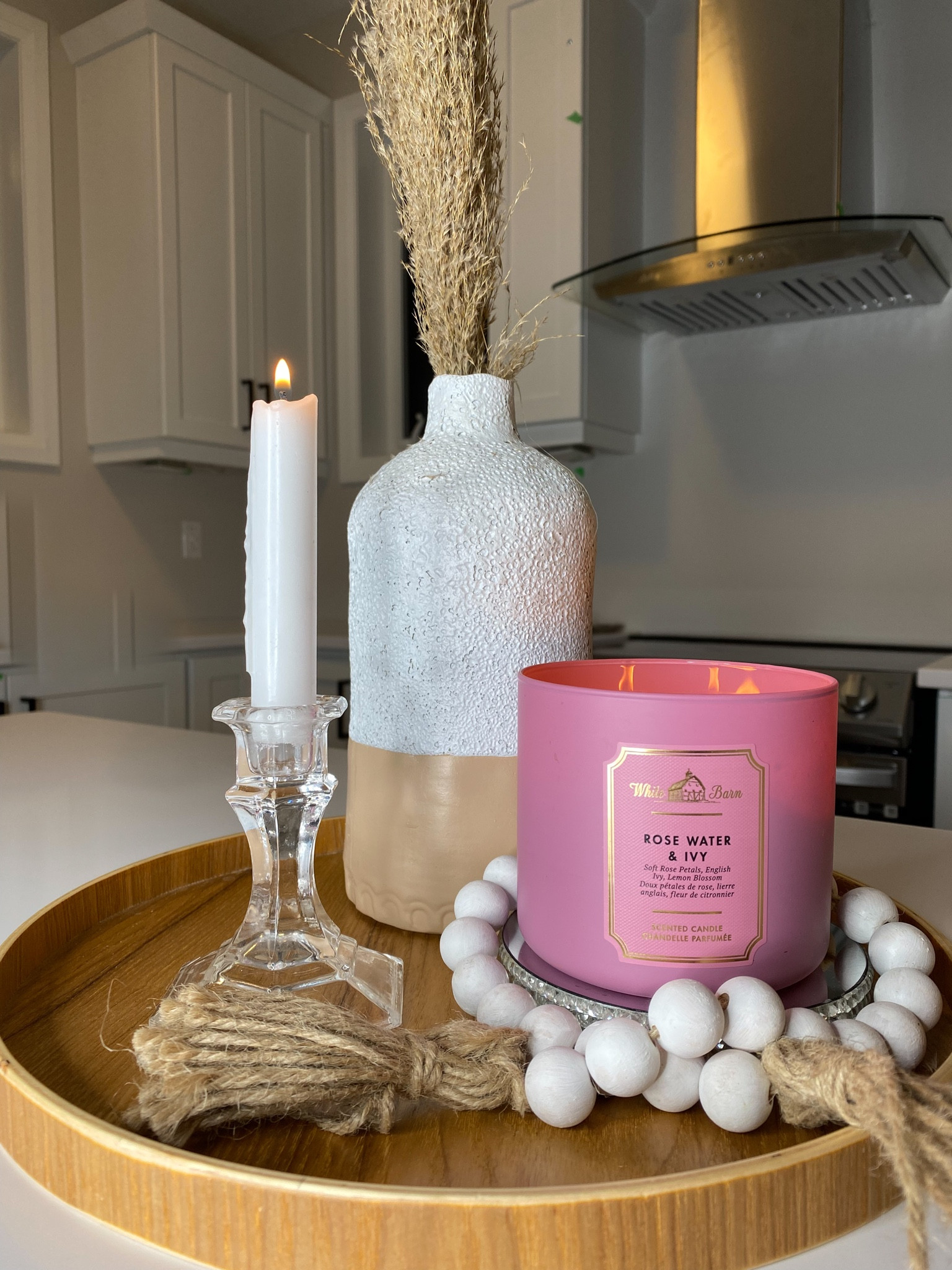 Kitchen Island Centrepiece 
• Candles
• White bead Garland 
• Vase with feathers
• Wooden Tray 

#LTKHoliday #LTKhome #LTKSeasonal