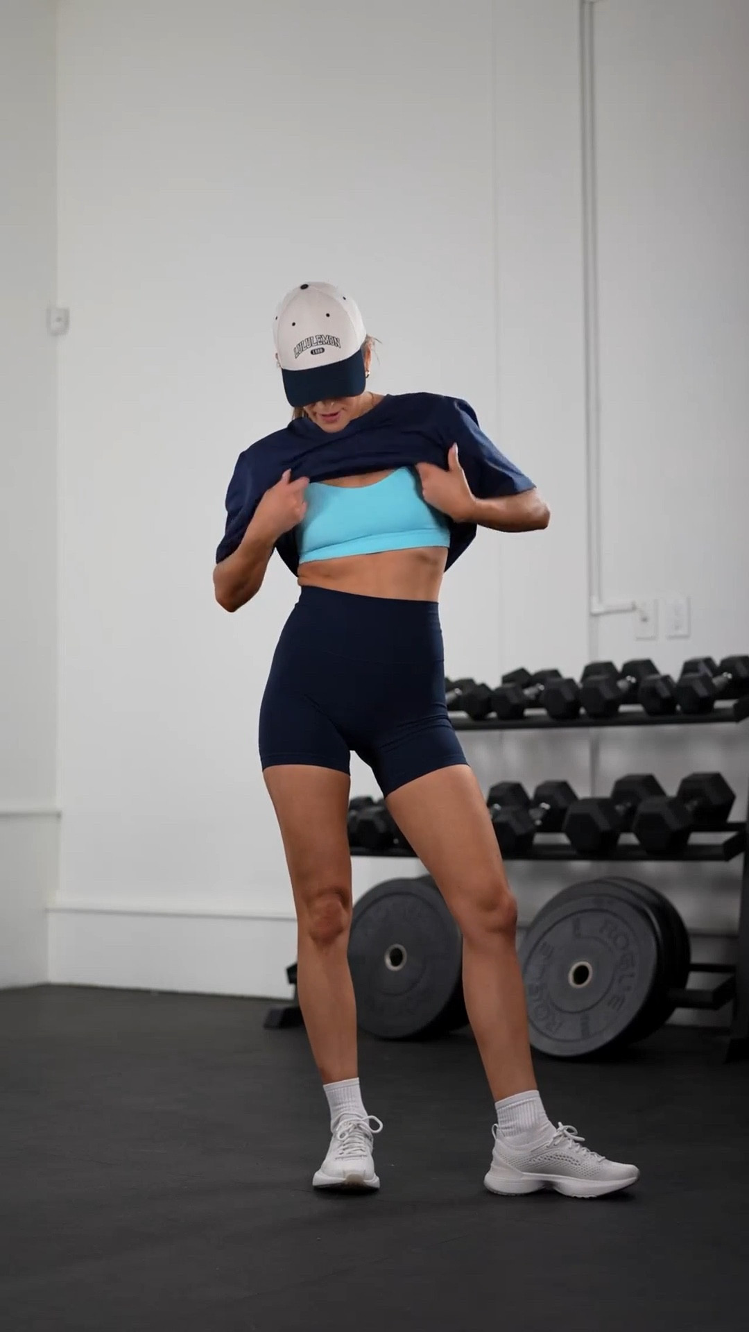 Navy workout outfit 🦋 ✨

I wear a size 4 in the shorts, 8 in the bra, and the shirt is a size L (thank you Chris)!

The shoes fit TTS 🫶🏼 It also looks like they are out of stock in the navy brim hat but they have green or just plain cream/black! 

#LTKfitness #LTKcanada #LTKstyletip