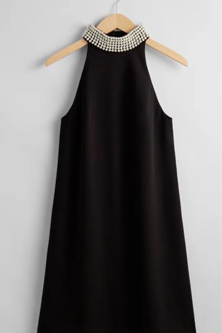Pearl neck black mini dress

#LTKHoliday #LTKstyletip #LTKSeasonal