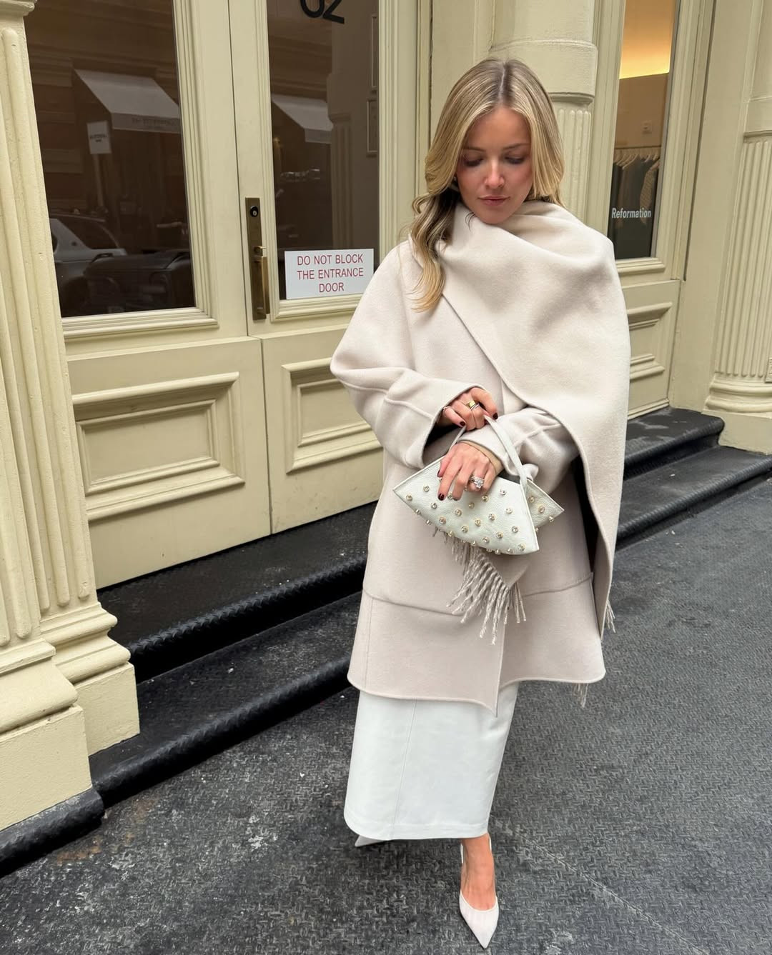 Soft tones for a busy NYFW day  Layered in the dreamiest cream wrap coat + midi skirt. 

 #LTKNYFW #LTKgrwm #LTKootd