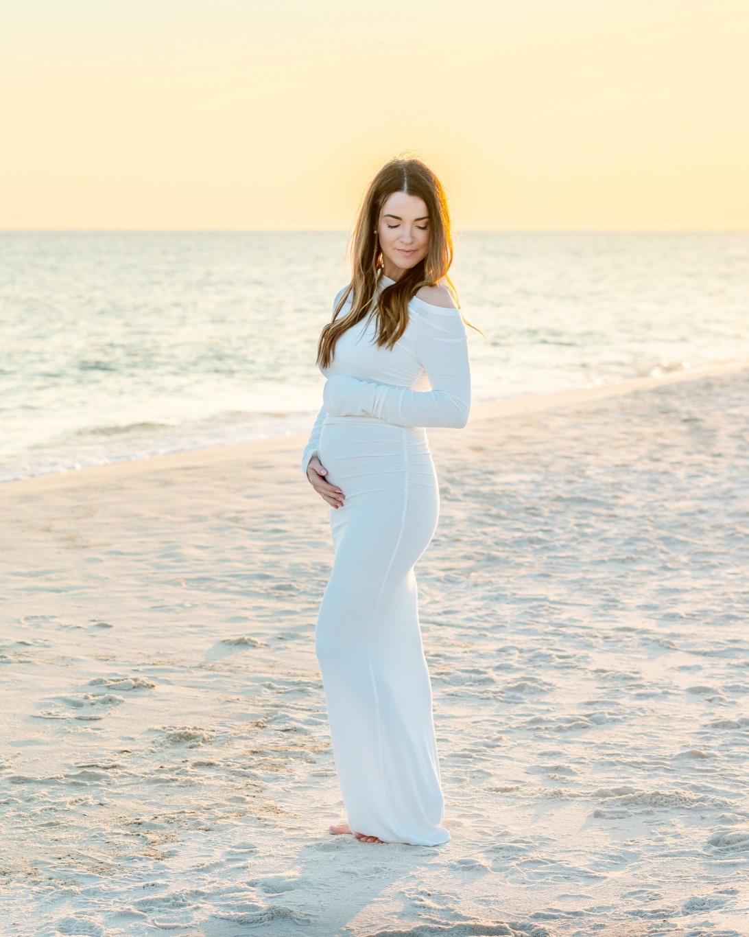 The perfect dress for our beach pregnancy announcement photos  Wearing my normal size small. 