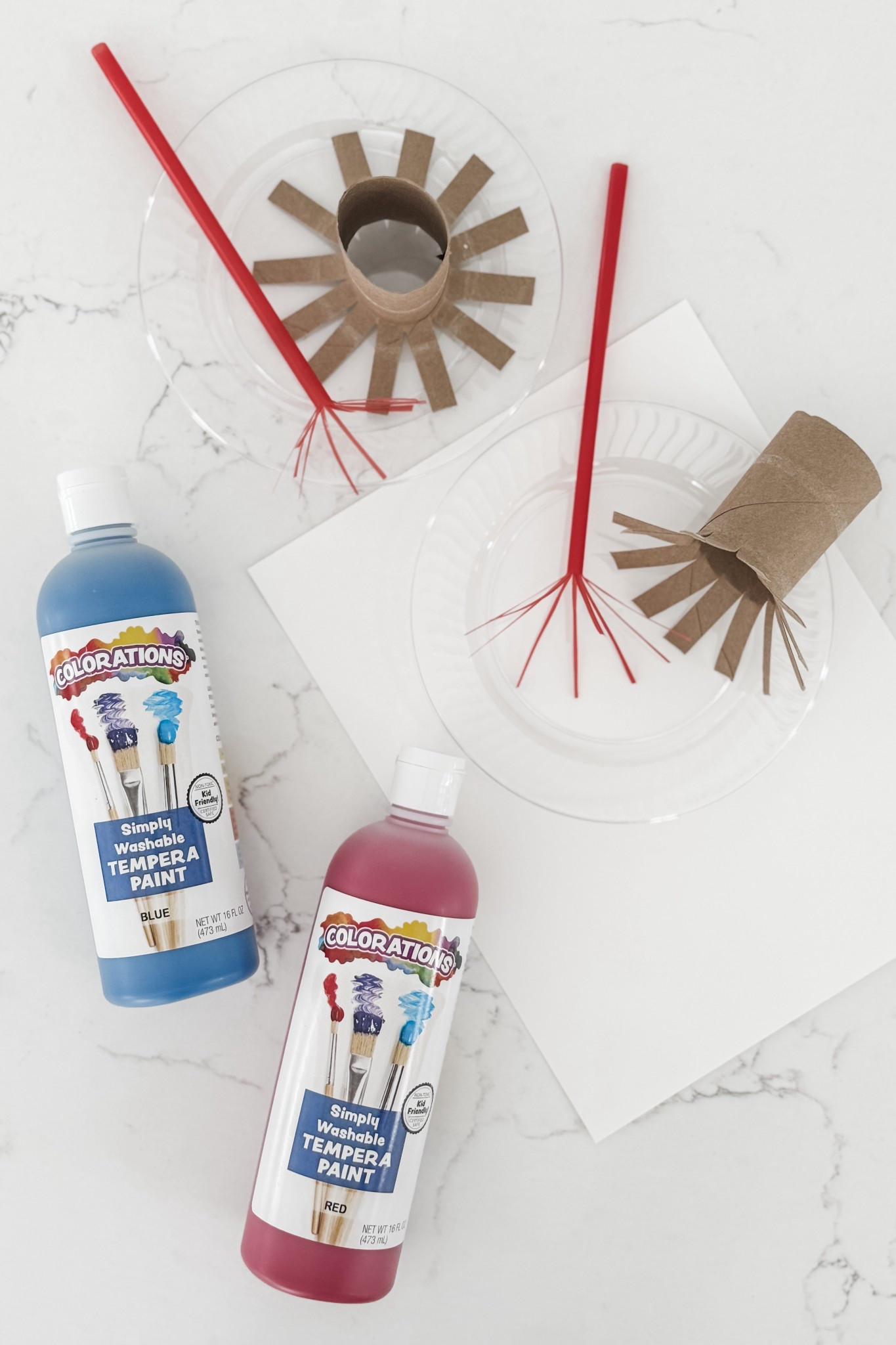 Camp Magic Playbook — 4th of July

Firework paint stamping activity for our #LTKToddler 

I cut slits in two toilet paper rolls and then in two plastic straws to use as the stampers. Then I poured blue and red paint onto little plates as the paint “palettes” — this was a quick but very fun activity for Independence Day! 🎆🇺🇸💙

#LTKKids