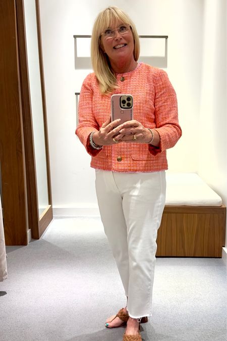 I love the classic style and  coral/hot pink
combination of this sweater jacket.  You can dress it up or down. I like the white jeans pairing with this sweater jacket.

#LTKworkwear #LTKtravel #LTKover40