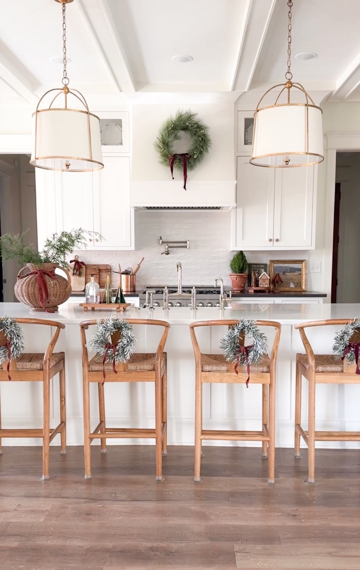 Our kitchen dressed up for the holidays 🎄
Greenery, crimson velvet ribbon, and a handful of decorative accents — ceramic gingerbread cookie jars and glass Christmas trees — keeping things simple, cozy, and seasonal.

#LTKSeasonal #LTKHoliday #LTKHome