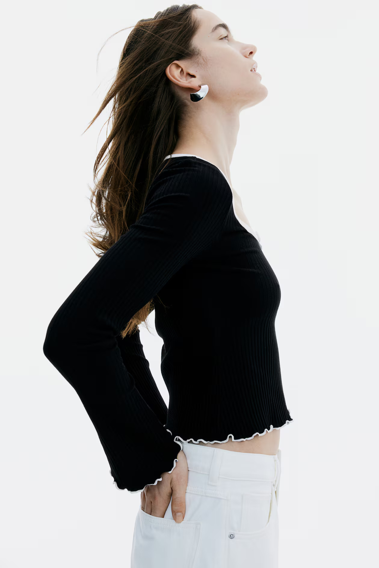 Maglia a coste con dettagli a overlock - Nero - DONNA | H&M IT | H&M (FR, IT, ES, PT, BE)